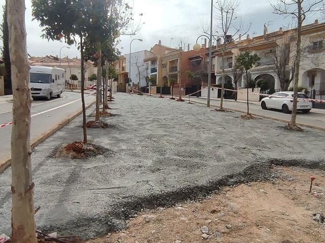 Cementación del bulevar donde antes había tierra. 