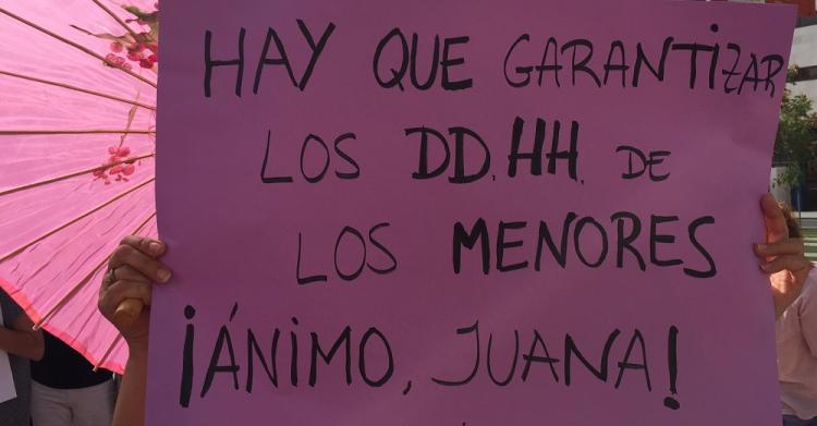 Cartel exhibido en la concentración de Granada.