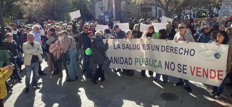 Pancarta que presidía la concentración.