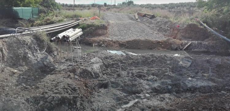 Los trabajos junto al río Genazar a la salida de la piscifactoría de Plines.