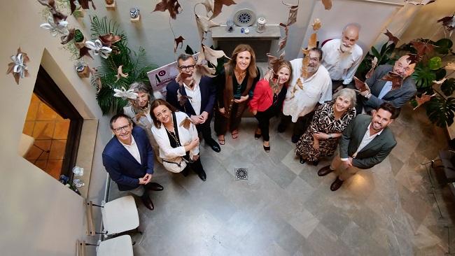 Foto de familia tras la presentación del programa de actividades.