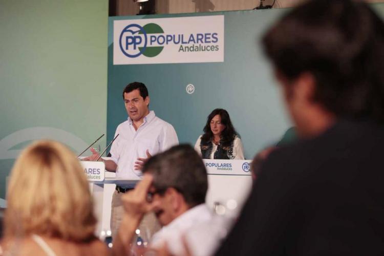 Moreno, en una reunión de su partido en Granada.