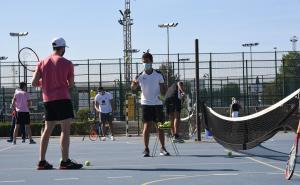 Actividad este lunes en una pista de tenis.