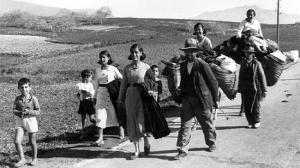 Población civil huyendo del avance de las tropas franquistas.