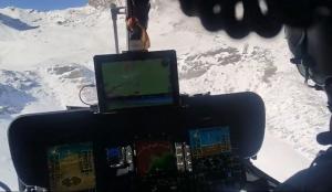 El helicóptero se dirige a la cañada de Siete Lagunas, arriba a la izq. de la imagen.