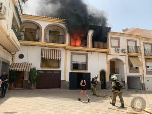 Incendio de una vivienda en Motril en junio de este año. 