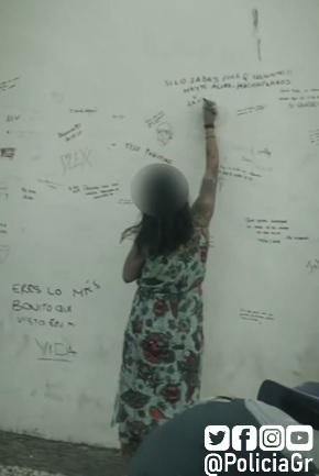 La autora de las pintadas, en una captura de la grabación difundida por la Policía Local. 