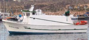 Pesquero remolcado.
