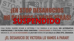 Cartel informando de la suspensión del desahucio.
