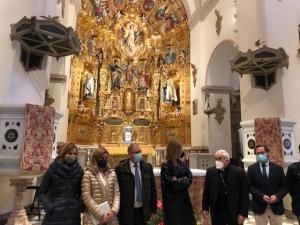 Visita al retablo recién restaurado de la Abadía.