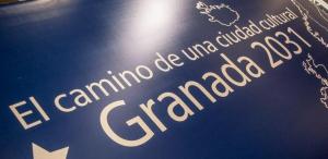 Logo y mensaje de la candidatura de Granada. 
