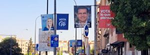 Carteles electorales de PSOE y PP en la capital.