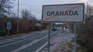Cartel indicando la salida del término municipal de Granada.