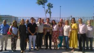 Los populares con comerciantes de Zaidín.