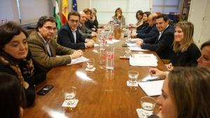Reunión del presidente del PP andaluz con responsables del Colegio de Médicos de Granada.
